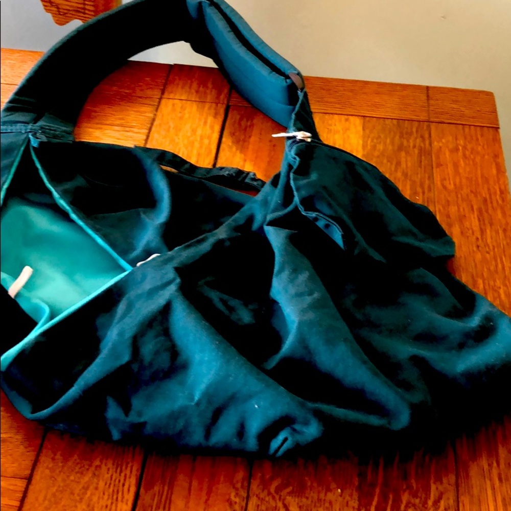 Fabric sling style dog carrier